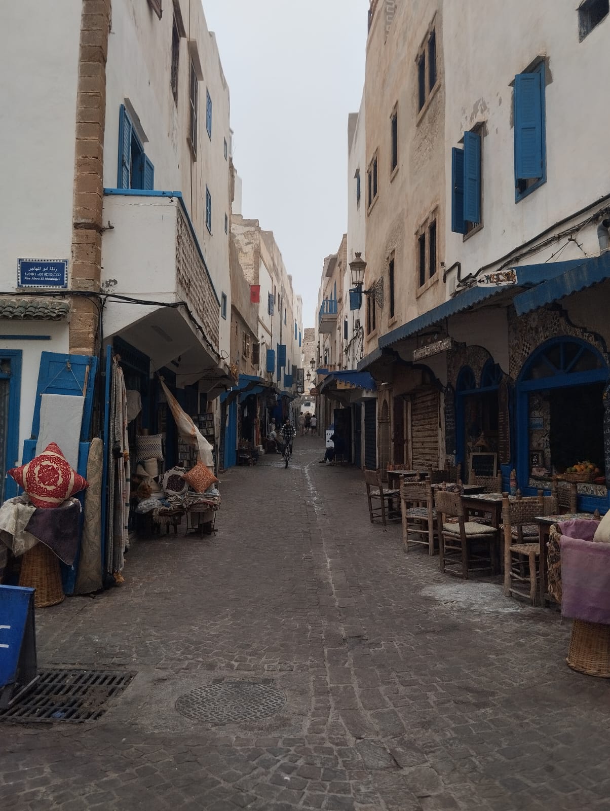 Moroccan street scene with shops and cafes in Essaouira